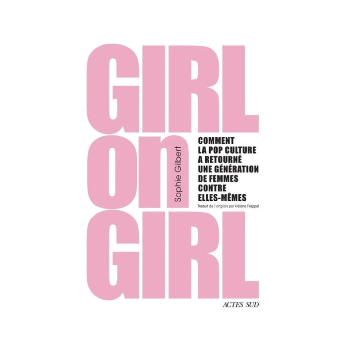 Book cover for 'Girl on Girl' by Sophie Gilbert; large pink block letters with a black subtitle about pop culture and women against themselves, publisher Actes Sud