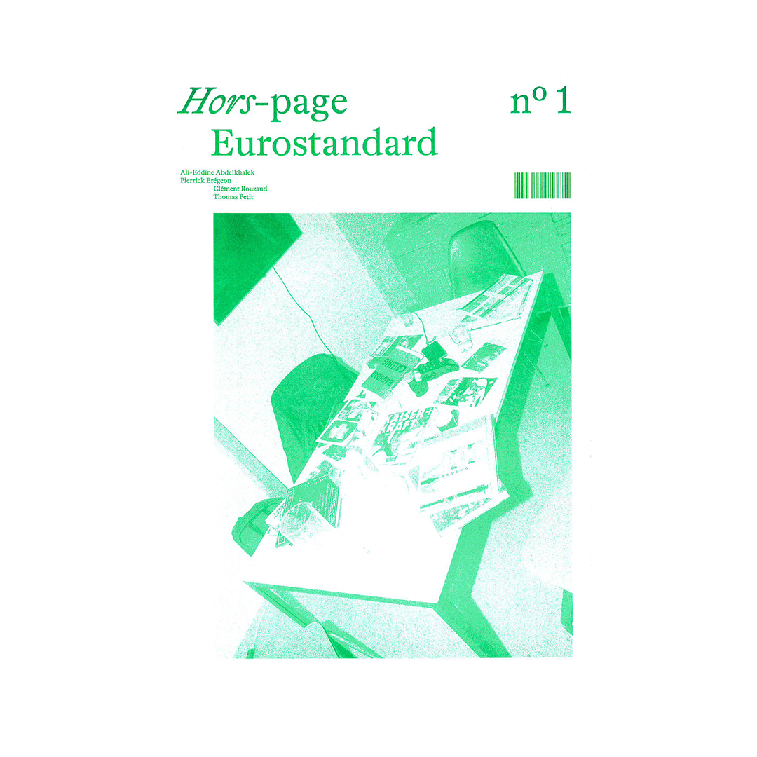 Cover of Hors-page Eurostandard No. 1; green-tinted design with a desk setup and barcode on the right side
